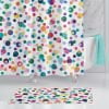 Kids shower curtain with playful polka dots