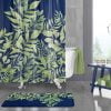 Add a touch of sophistication to your bathroom with this royal blue and green watercolor leaves shower curtain