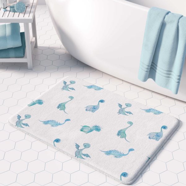 Blue dinosaur patterned bath mat for a baby boy's bathroom