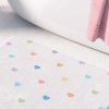 Non slip microfiber bath mat with pastel love hearts pattern.