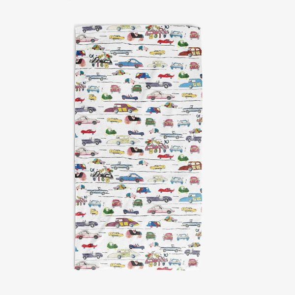 Colorful towel featuring hand-drawn cars on a white background.