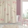 Close-up of shabby chic floral shower curtain.