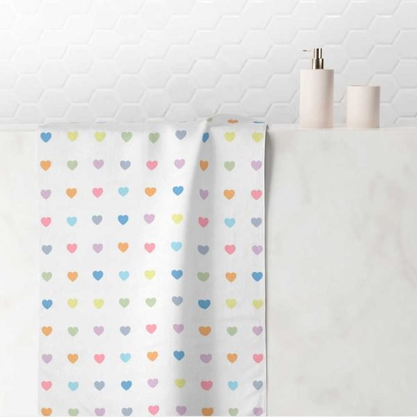 white hand towel with pastel love hearts