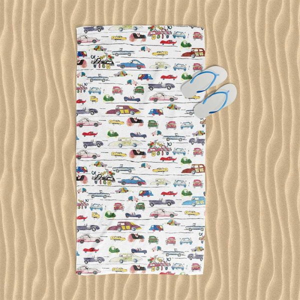 Playful beach towel with a vibrant crazy cars pattern.