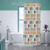 Colorful plaid shower curtain with vibrant multicolored squares and sturdy metal grommets for easy hanging