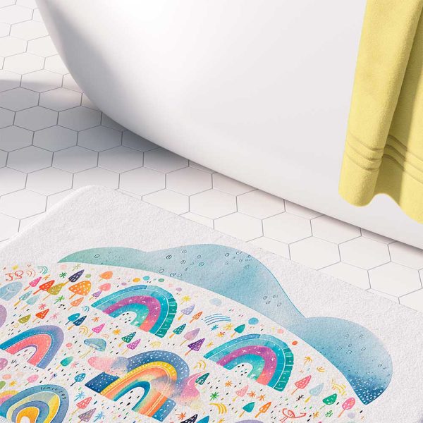 Colorful rainbow bath mat with anti-skid technology for children's bathroom decor.