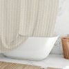 Coastal beige and white pebble striped shower curtain by Ozscape Designs hanging in a bathroom.
