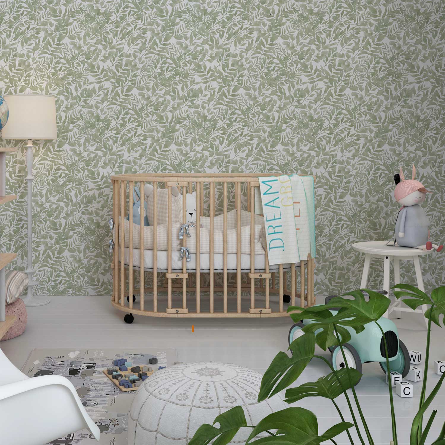 Serene green watercolor leaf peel and stick wallpaper in a baby nursery