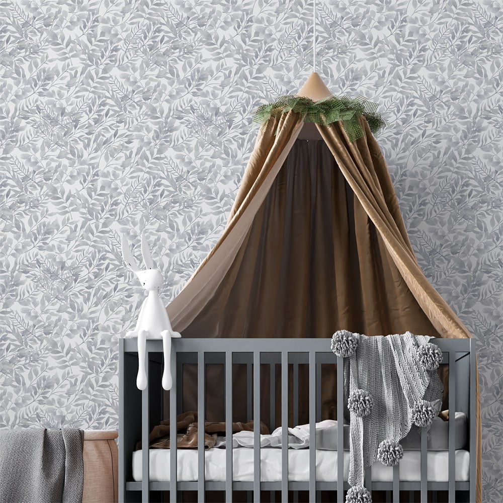 Gray watercolor leaf neutral wallpaper in a baby nursery