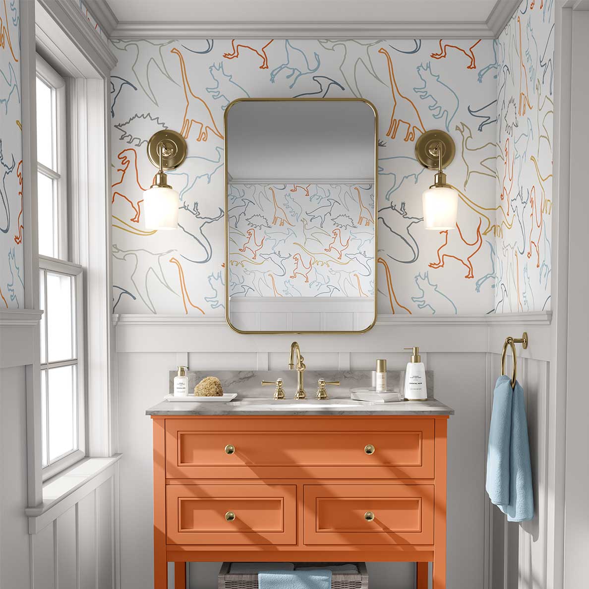 Dinosaur wallpaper in modern contemporary design with orange, gray, blue, mustard, and white colors in a kids bathroom.