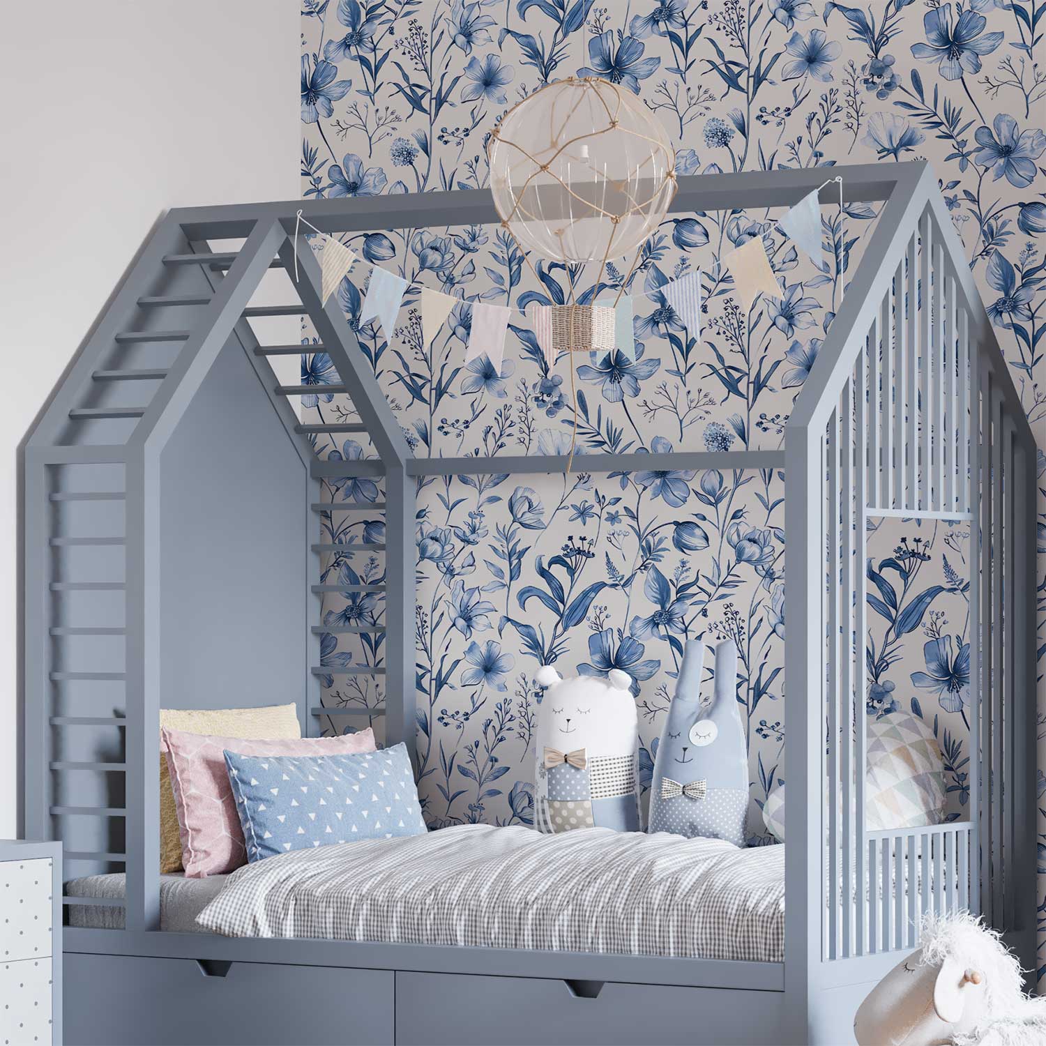 Playful blue watercolor floral wallpaper in a kids' bedroom